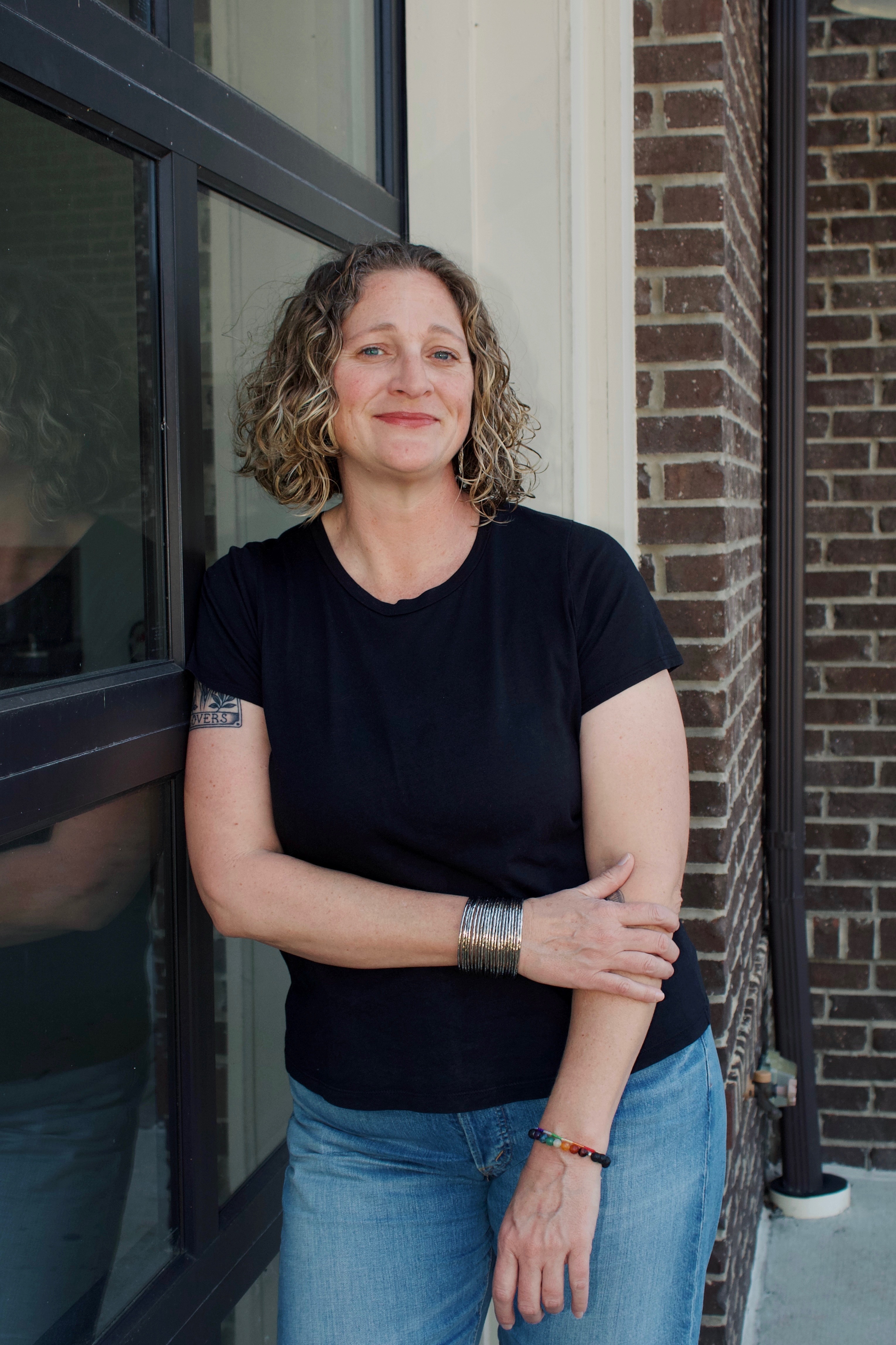 Dalice standing outside a local Rock Hill storefront